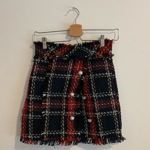 never worn checkered tweed skirt with pearl button